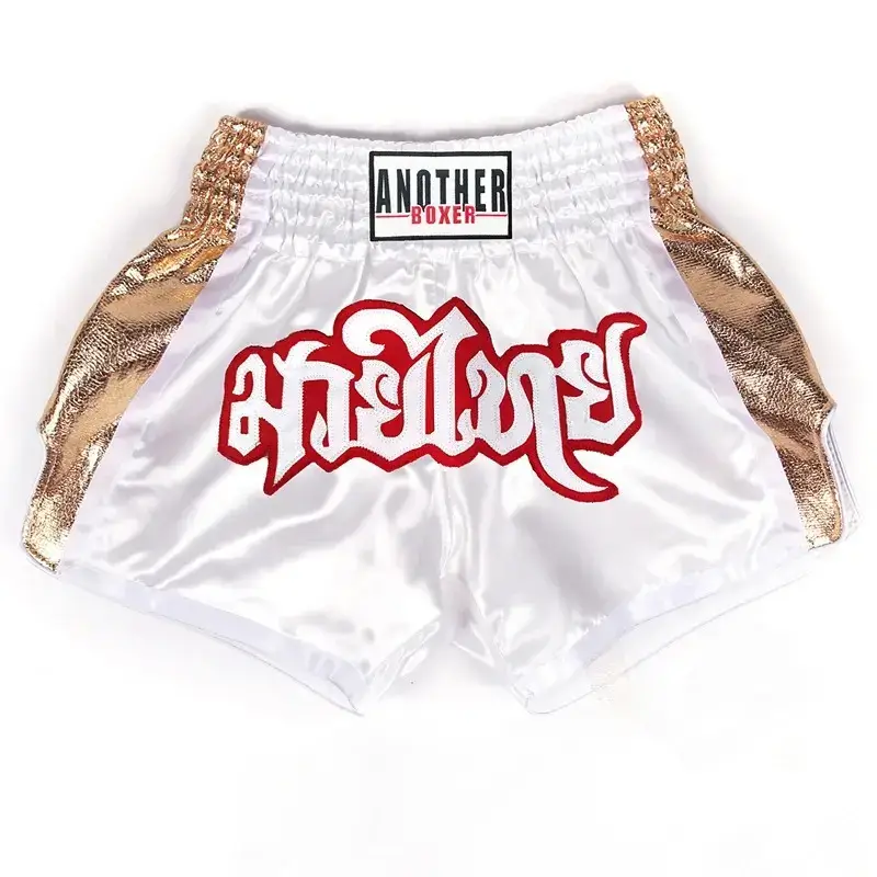 white and gold boxing shorts