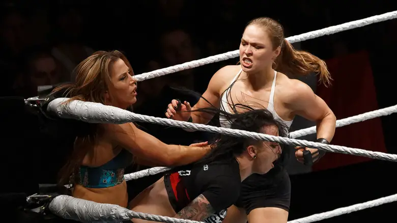 Becky Lynch, Charlotte Flair, and Ronda Rousey